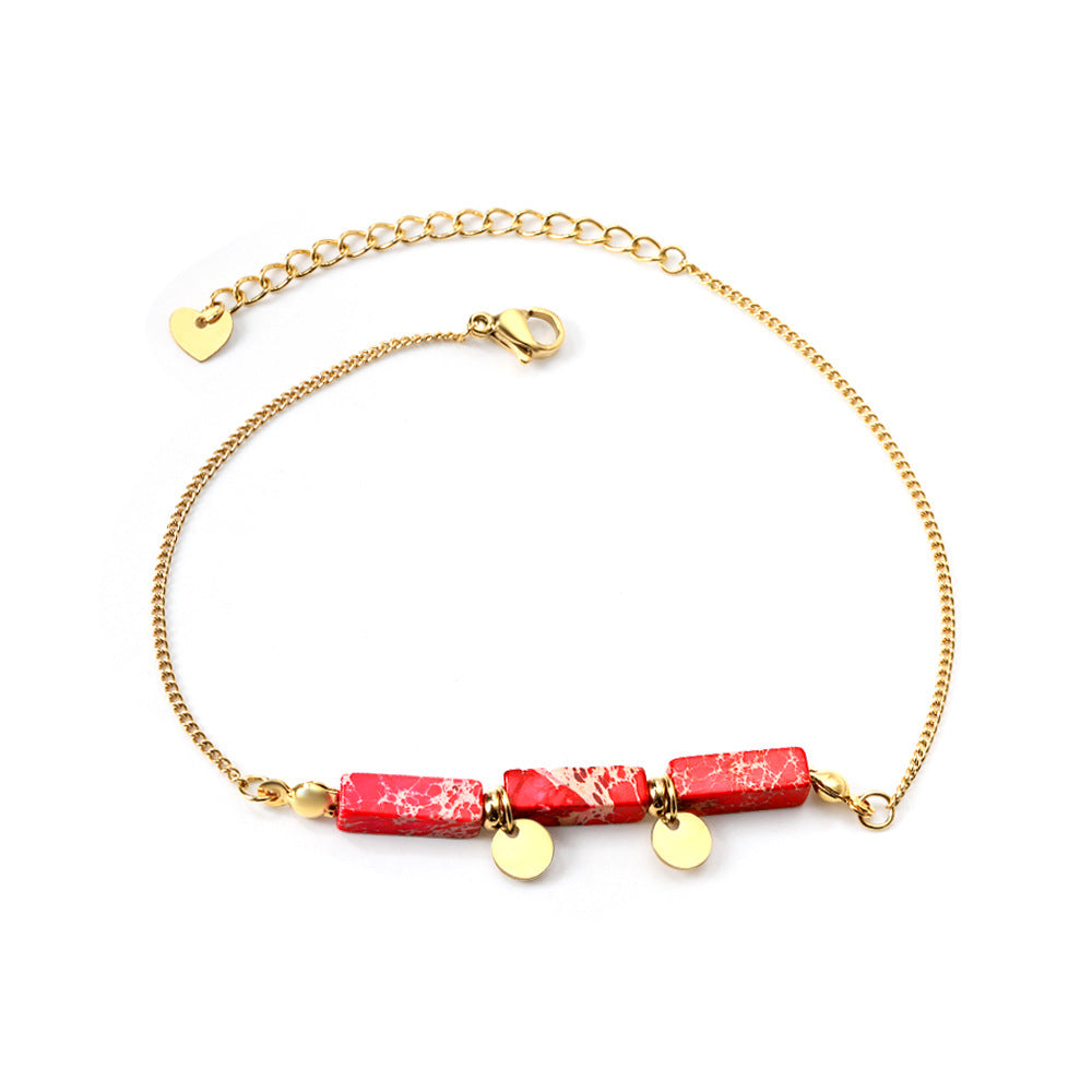Damen Armband mit funkelnden Karibikstein-Elementen aus hochwertigem Edelstahl und goldplattierten Akzenten Shop Nory