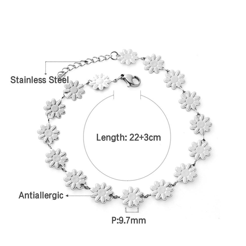 Damen Armband mit floralen Anhängern aus goldplattiertem Edelstahl Shop Nory