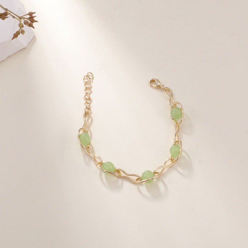 Damen Armband mit kunstvoll geflochtenem Design und edlen Halbedelsteinen Shop Nory