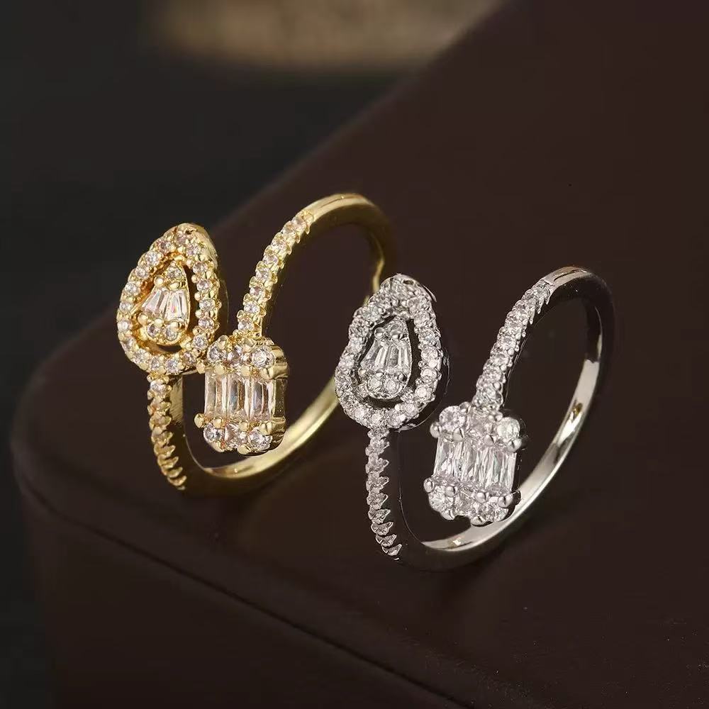 Damen eleganter Ring mit funkelnden Zirkonia und doppelt gefasstem Design Shop Nory