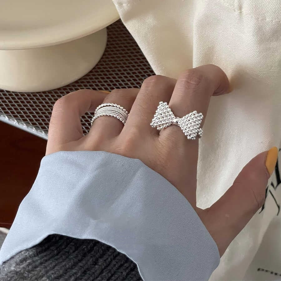 Damen Ring im verspielten Schleifen-Design aus hochwertigen Perlen Shop Nory