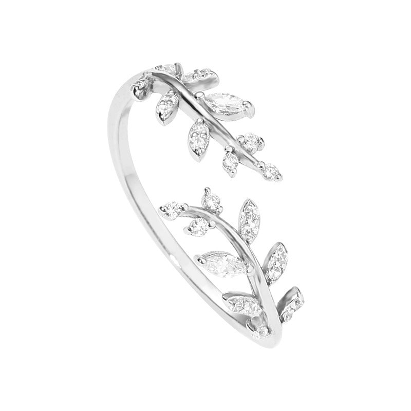 Damenring mit filigranem Blattdesign und funkelnden Zirkonia Shop Nory