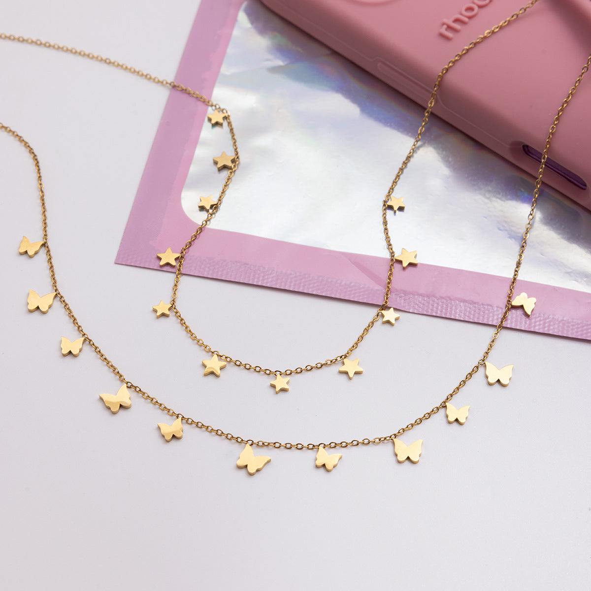 Damen Halskette mit funkelnden Sternanhängern aus hochwertigem Edelstahl Shop Nory