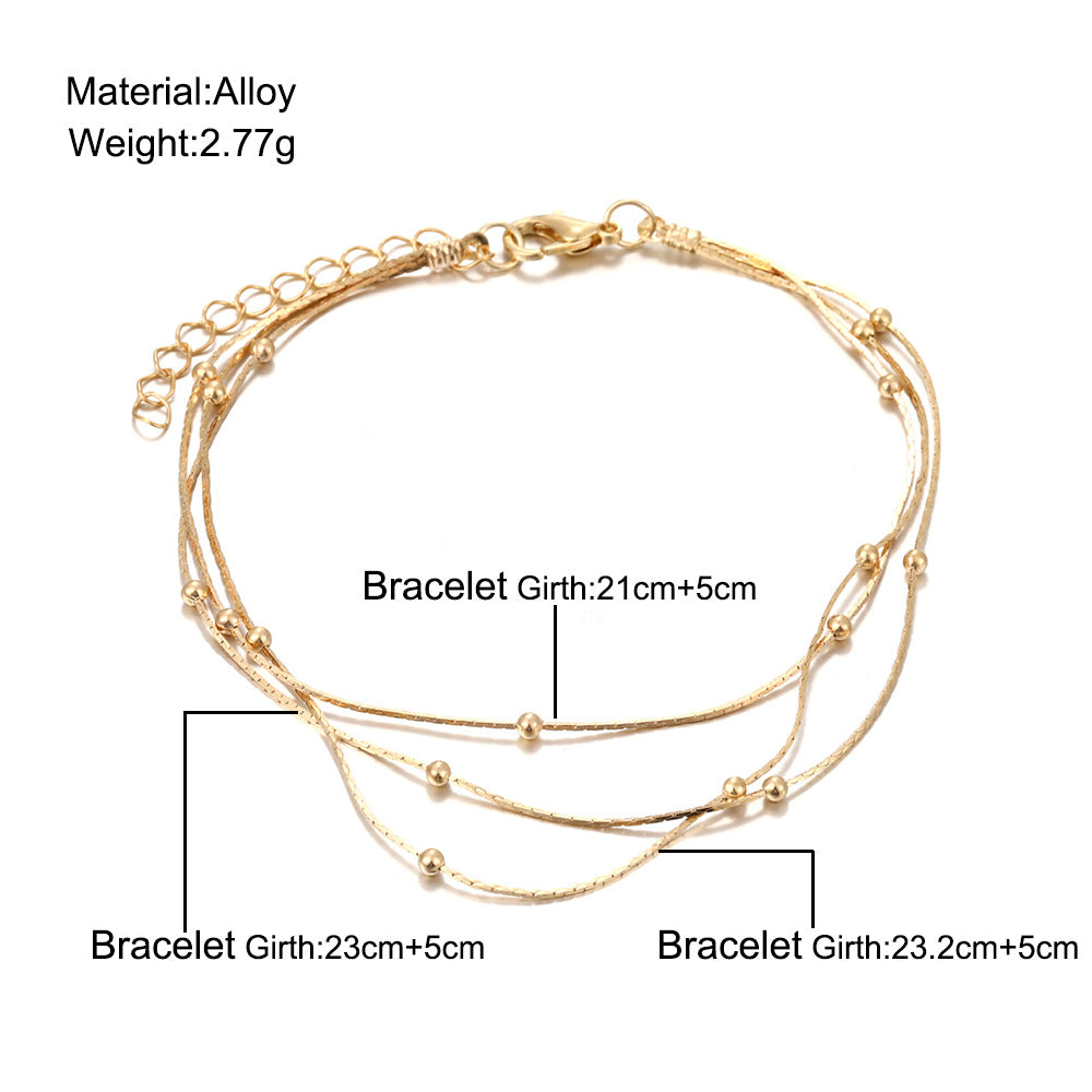 Damen Fußkettchen mit eleganten, goldenen Akzenten Shop Nory