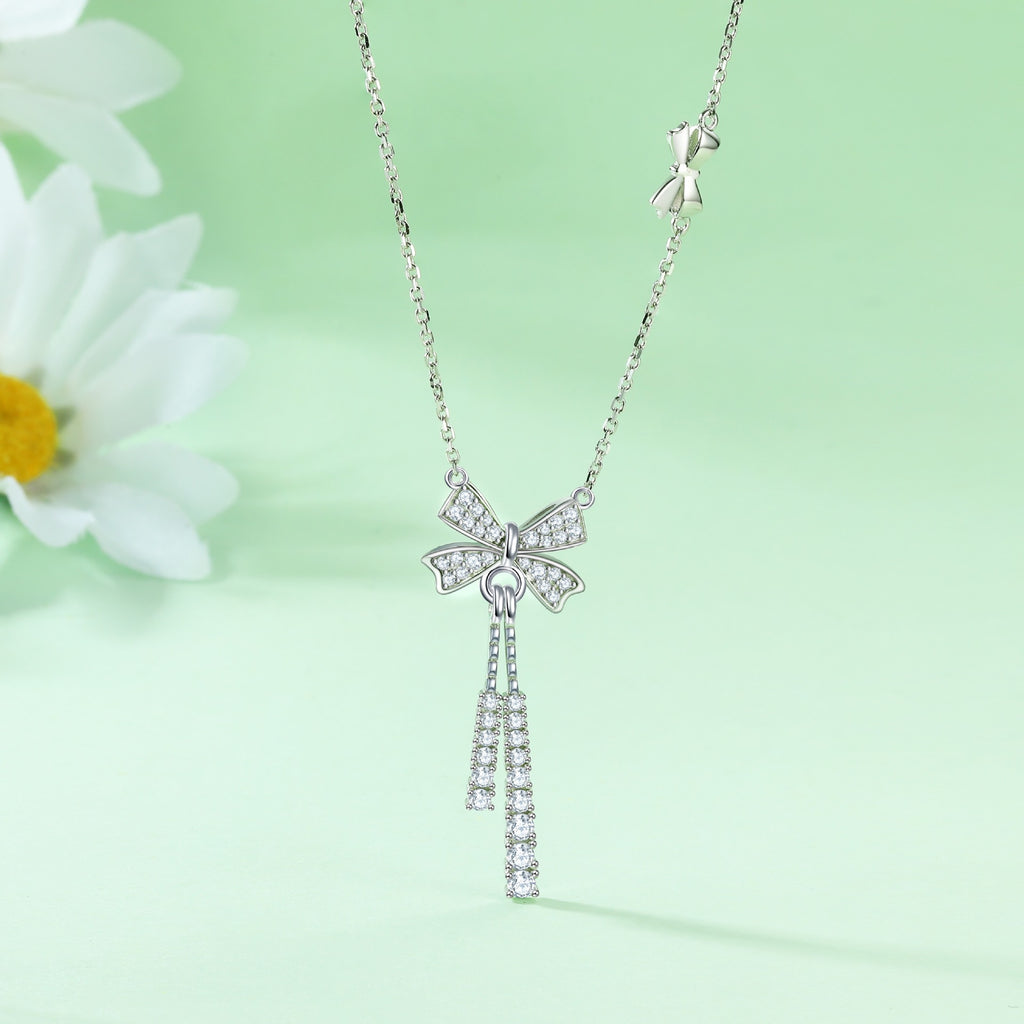 Damen Halskette mit kunstvollem Schleifenmotiv und funkelnden Zirkonia-Details Shop Nory