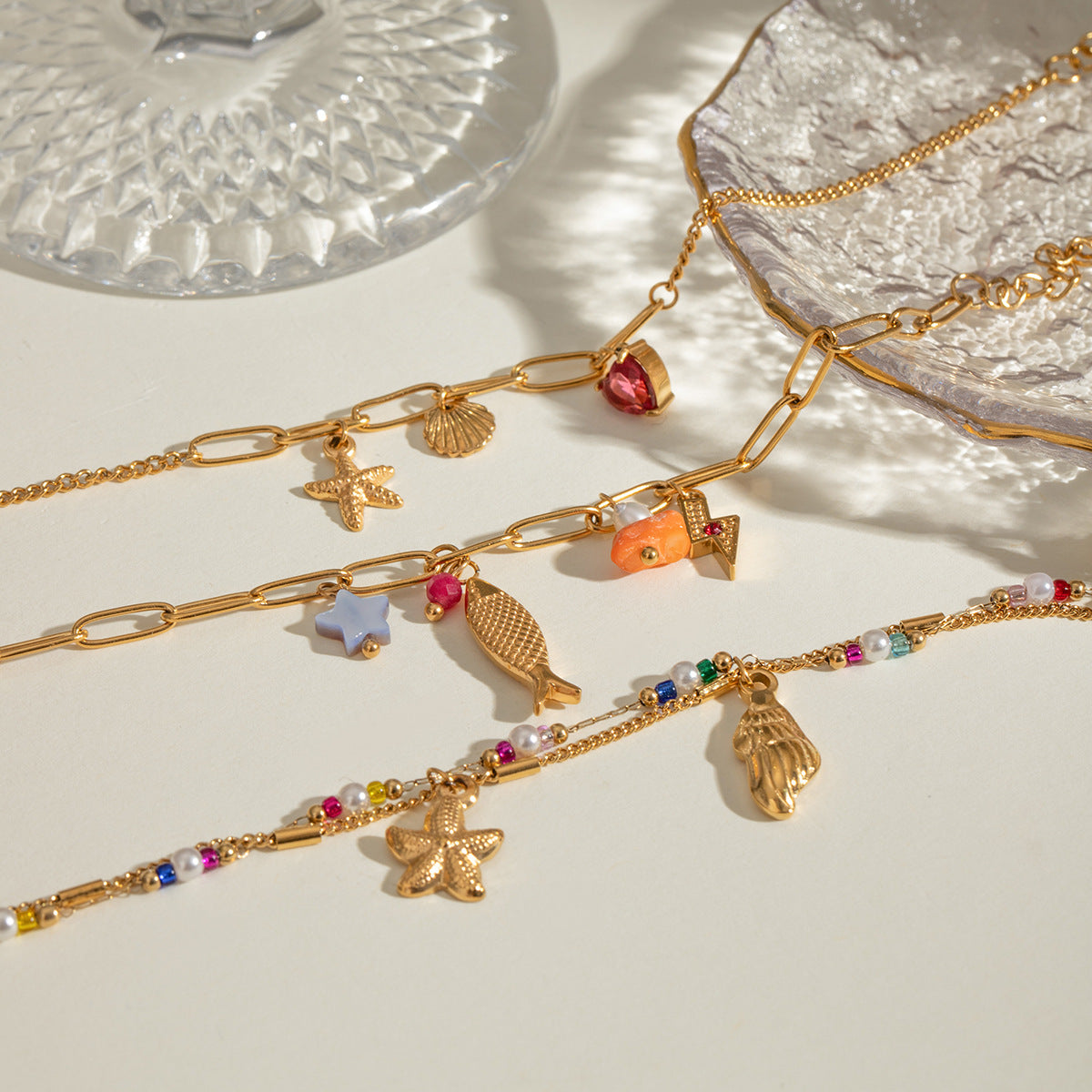 Damen Armband mit bunten Perlen und funkelndem Sternenanhänger Shop Nory
