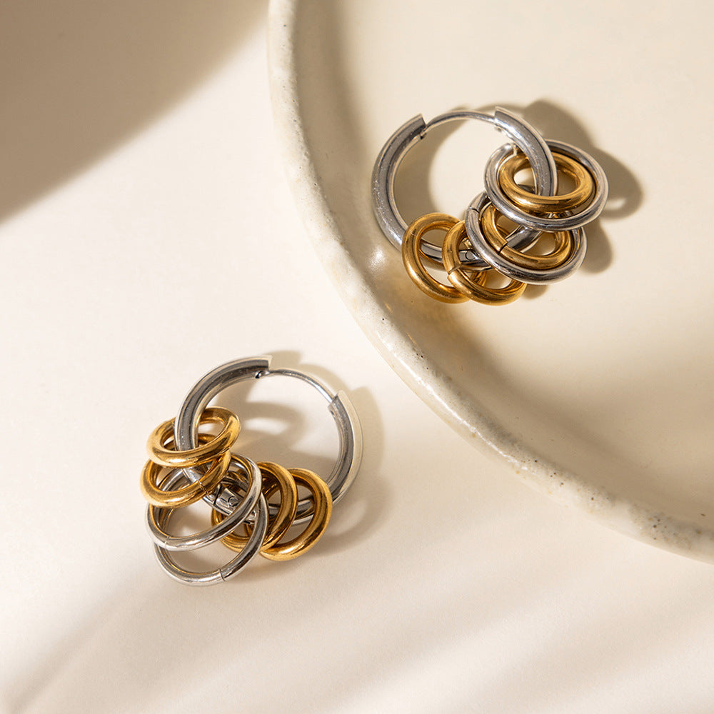 Damen Creolen mit modernem Spiral-Design aus hypoallergenem Edelstahl Shop Nory