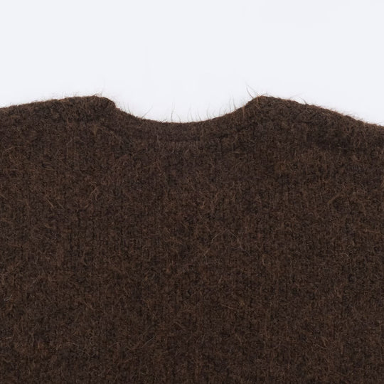 Damen Oversize Strickmantel mit V‑Ausschnitt, kuscheliger Bouclé‑Optik und aufgesetzten Taschen Shop Nory