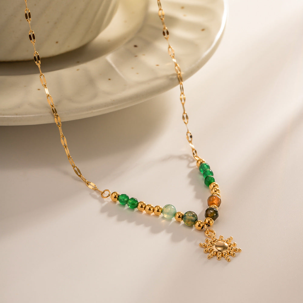 Damen Halskette mit farbigen Edelsteinen und goldener Sonnenanhänger Shop Nory