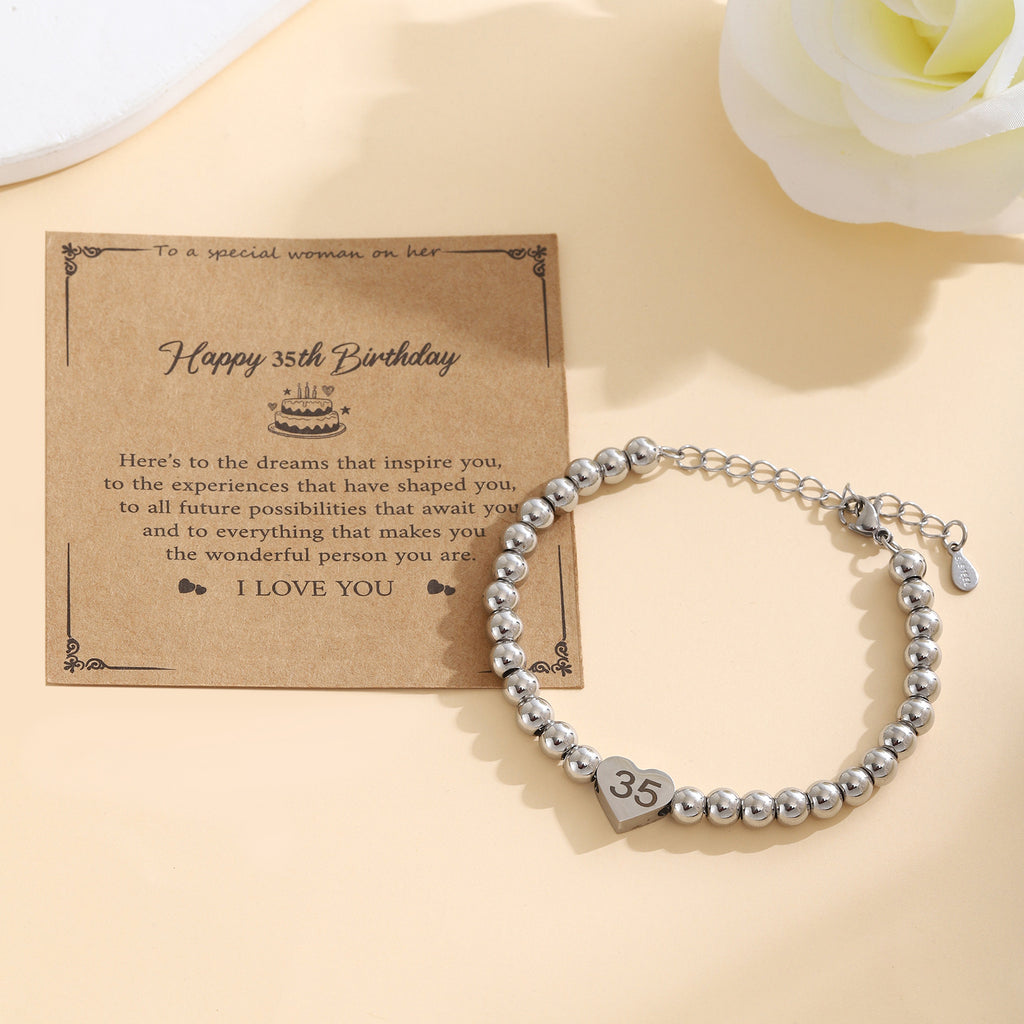 Damenarmband mit Herzanhänger und personalisierbarem Charm Shop Nory