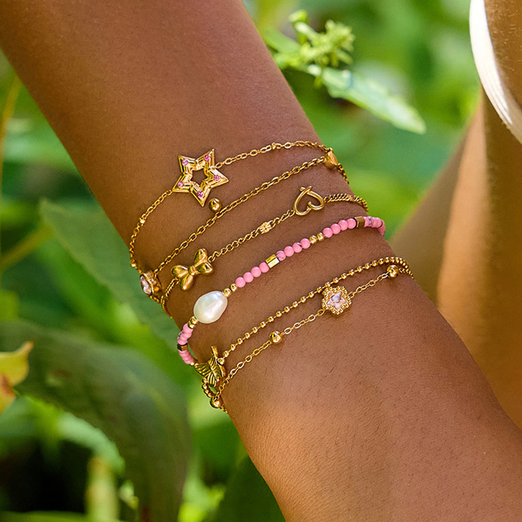 Damen Armband aus hypoallergenem Edelstahl mit bunten Perlen und Perlenelement Shop Nory