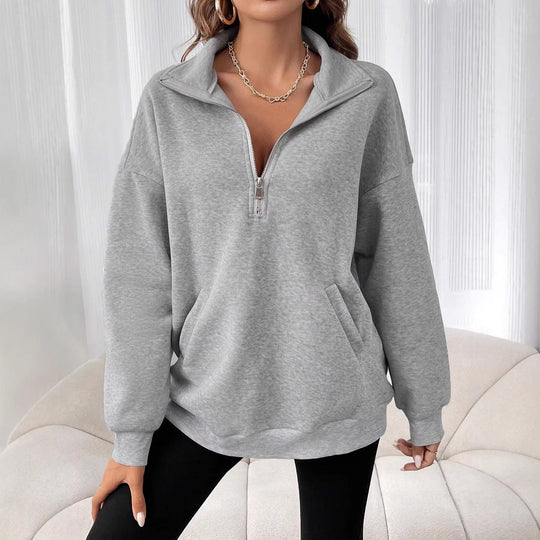 Damen Oversize Sweatshirt mit halbem Reißverschluss, Kängurutasche und Stehkragen Shop Nory
