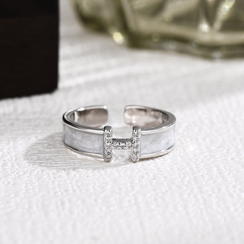 Damen Offener Ring mit kunstvollem Design und funkelnden Zirkonia Shop Nory