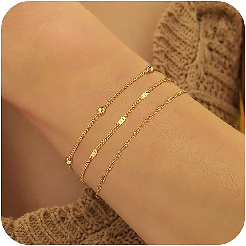 Damen zartes Fußkettchen-Set mit feinen Glieder- und funkelnden Zirkonia-Details Shop Nory