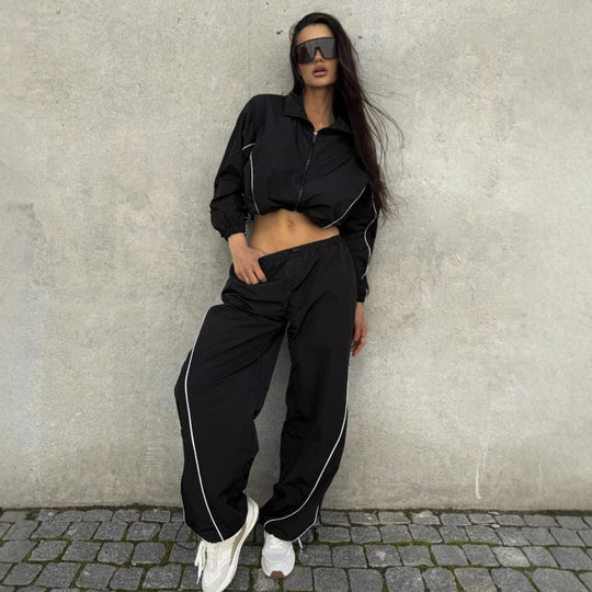 Damen Kurz geschnittene Windbreaker Jacke mit halbem Reißverschluss, Tunnelzug und elastischen Bündchen Shop Nory