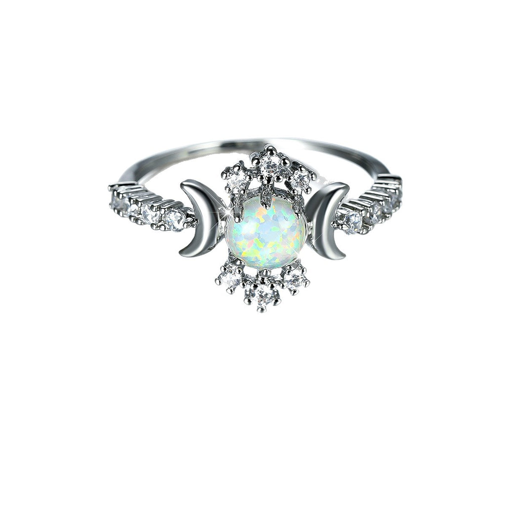 Damen Ring mit schimmerndem Opalsteinglanz und funkelnden Zirkonia-Elementen Shop Nory