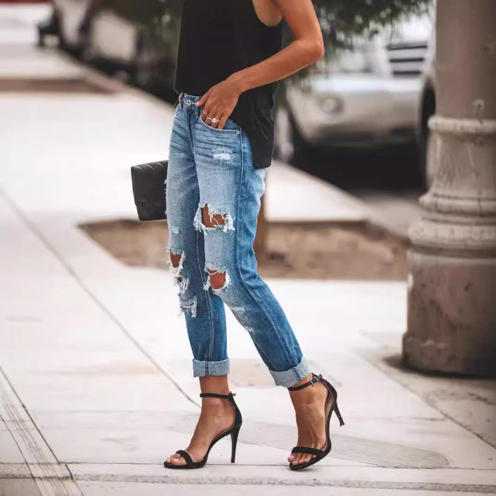 Damen Ripped Boyfriend Jeans mit lässigem Schnitt und fransigen Elementen