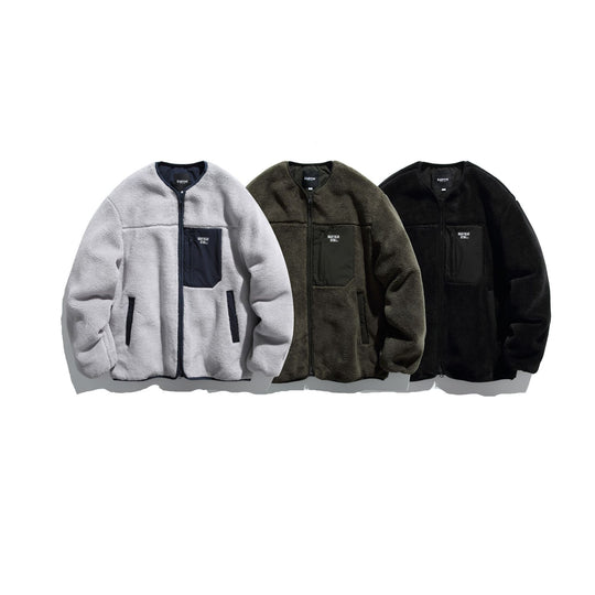 Unisex Kurz geschnittene Teddy‑Fleecejacke mit Nylon‑Brusttasche und durchgehendem Reißverschluss Shop Nory
