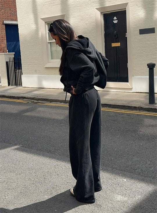 Damen gekürztes Kapuzen-Sweatshirt mit Oversize-Ärmeln und high-waist Wide-Leg Freizeithose Shop Nory