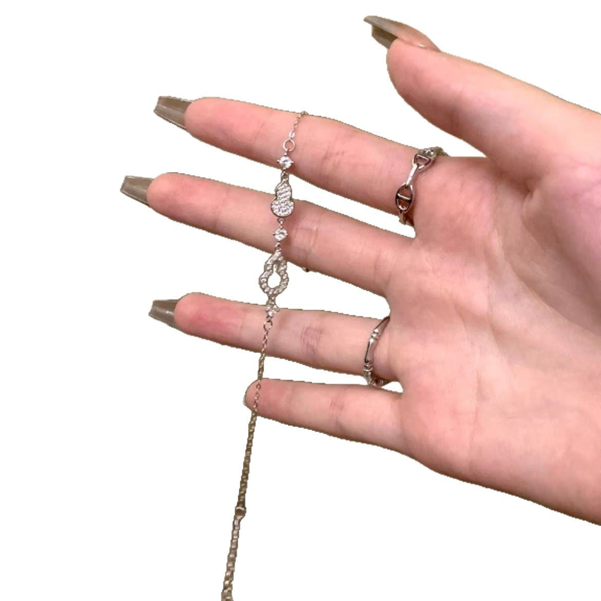 Damenarmband mit funkelnden Zirkonia-Elementen und zartem Design Shop Nory