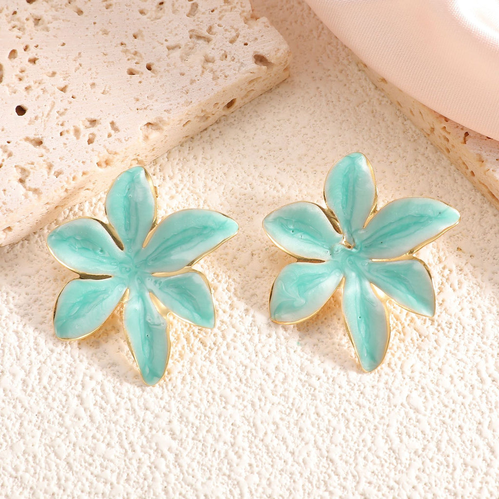 Damen Ohrringe mit floralem Design und elegantem Goldrand Shop Nory