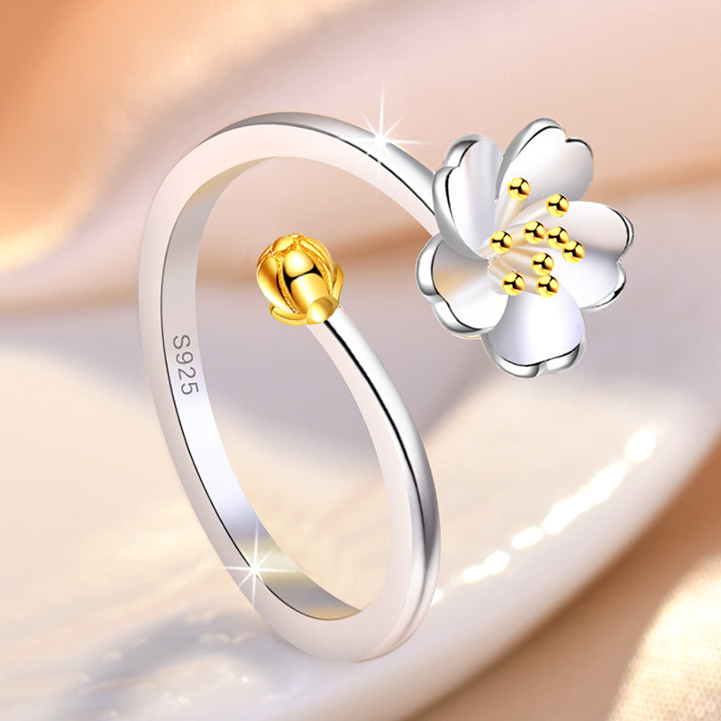Damenring mit floralem Design und feiner Goldverzierung Shop Nory