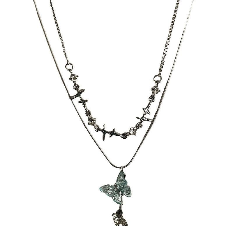 Damen Kette mit filigranem Schmetterlingsdesign und bunten Natursteinakzenten Shop Nory