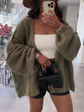 Damen oversized Strickjacke mit lässigen Ballonärmeln und strukturiertem Material