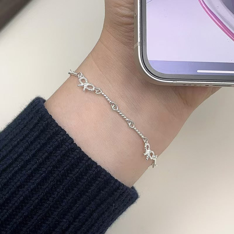 Damen zartes Armband mit einzigartigem Schleifenmuster Shop Nory