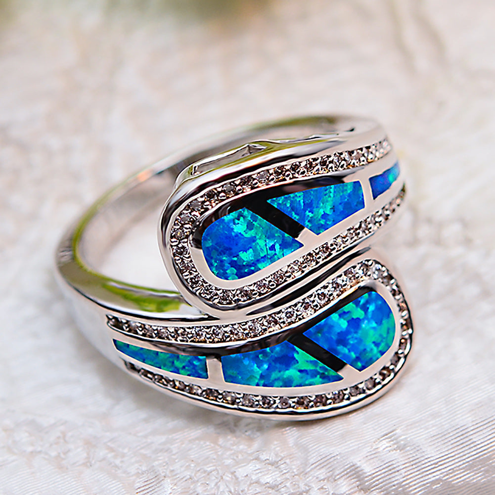 Damen Ring mit kunstvollem Opaldesign und funkelnden Zirkonia Shop Nory