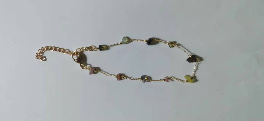 Damen Armband mit natürlichen Edelsteinen und goldfarbenen Akzenten Shop Nory