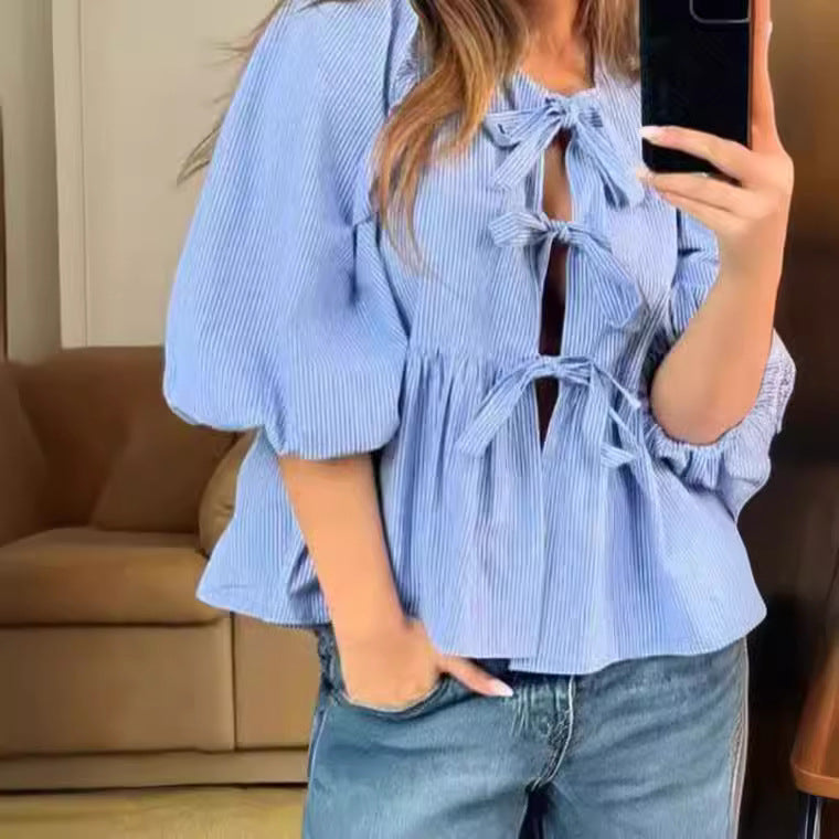 Damen Bluse mit raffinierten Schleifen und voluminösen Ärmeln
