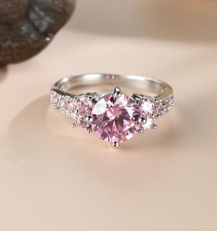 Damen Ring mit extravaganten Zirkonia-Einsätzen und funkelndem Rosenquarz Shop Nory