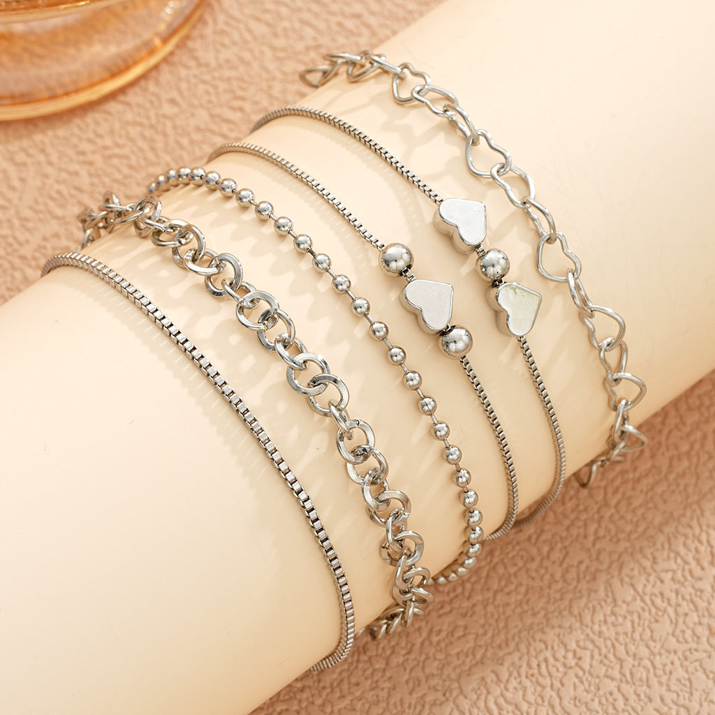 Damen Armband-Set mit filigranen Herzmotiv und funkelnden Akzenten Shop Nory