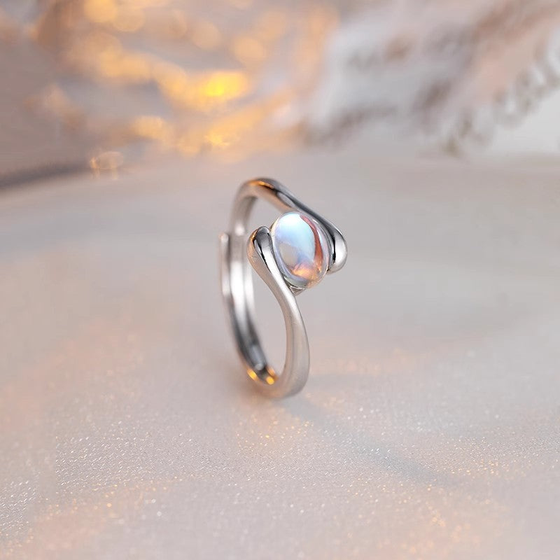 Damen zierlicher Ring mit eleganter Perle und geschwungenem Design Shop Nory