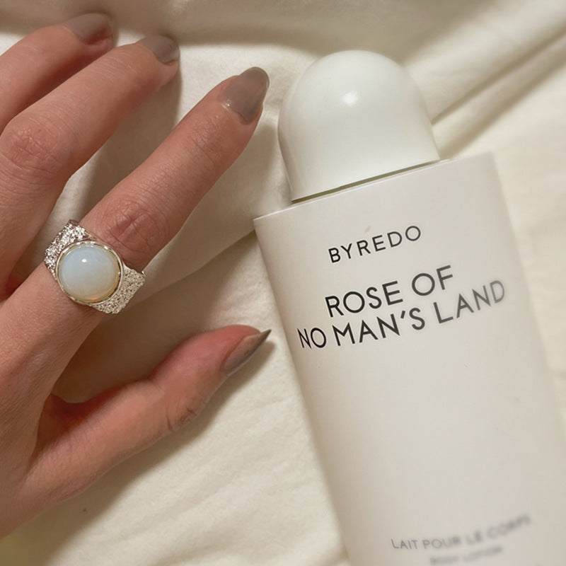 Damenring mit edlem Opal-Element und filigranem Silberdesign Shop Nory