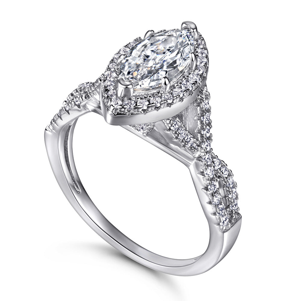 Damen eleganter Verlobungsring mit ovalem Hauptstein und kunstvollem Zirkonia-Besatz Shop Nory