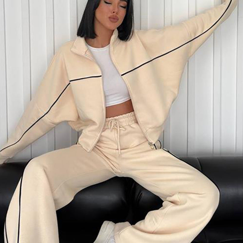 Damen lässiges Sweatset mit Stehkragen Reißverschluss gekürzter Jacke und hochtaillierter Schlaghose Shop Nory
