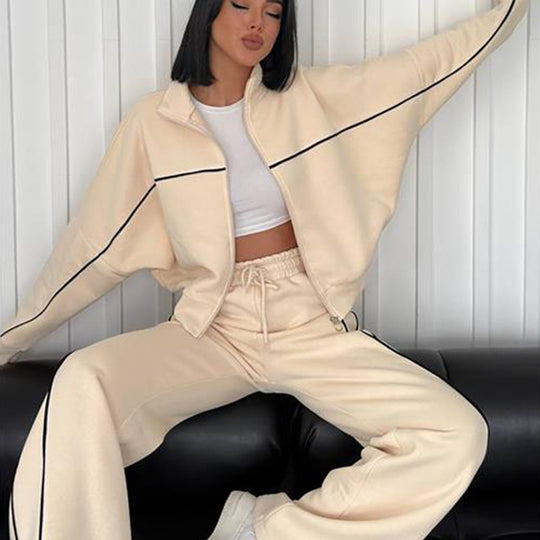 Damen lässiges Sweatset mit Stehkragen Reißverschluss gekürzter Jacke und hochtaillierter Schlaghose Shop Nory