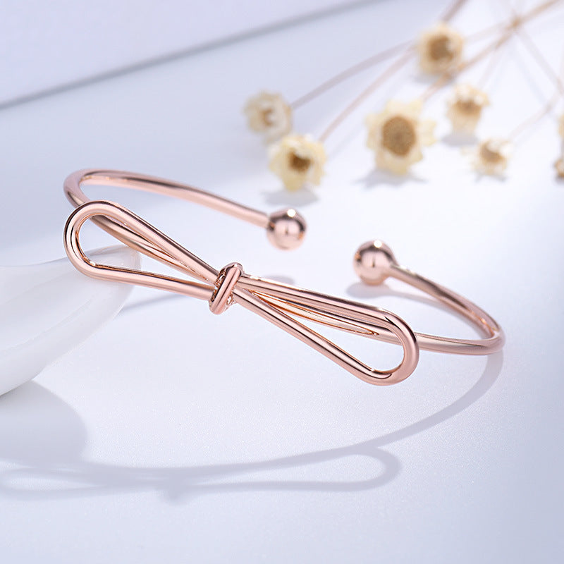 Damen Offenes Armband mit kunstvollem Schleifen-Design Shop Nory
