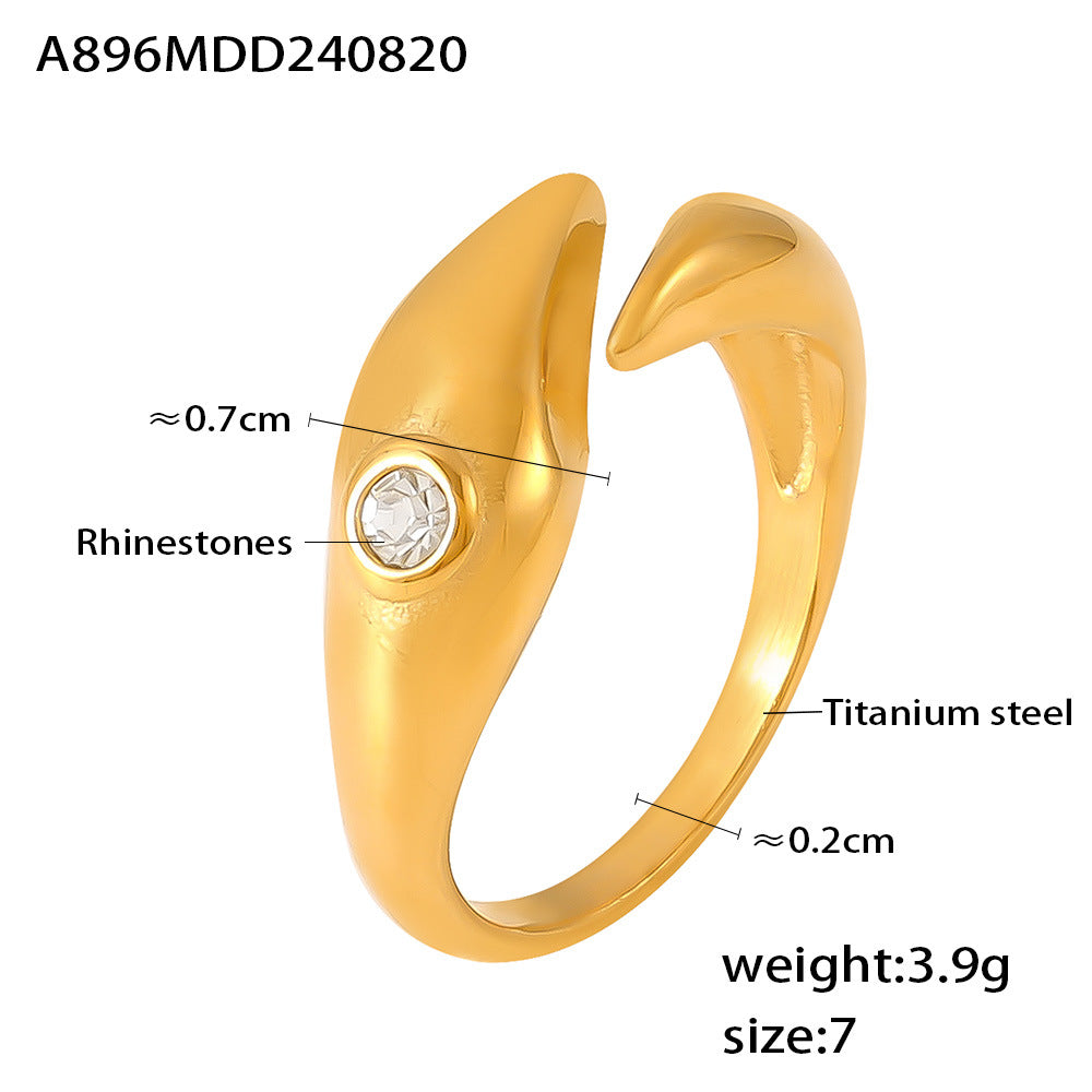 Damenring mit schickem Wellen-Design aus Titanstahl und funkelnden Strasssteinen Shop Nory