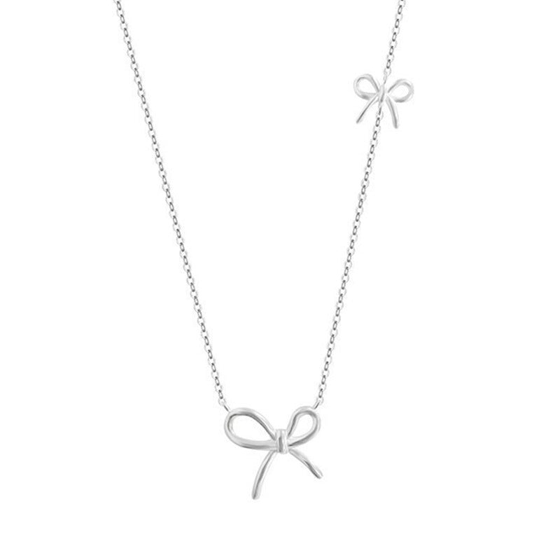 Damen Silberne Halskette mit stilvollem Schleifen-Design Shop Nory