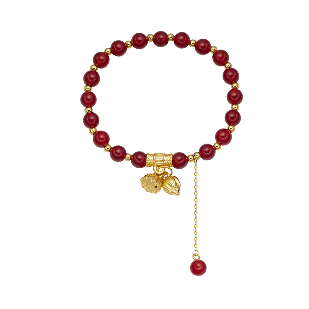 Damen Armband mit kunstvollen Anhängern und eleganten Perlenelementen Shop Nory
