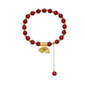 Damen Armband mit kunstvollen Anhängern und eleganten Perlenelementen Shop Nory
