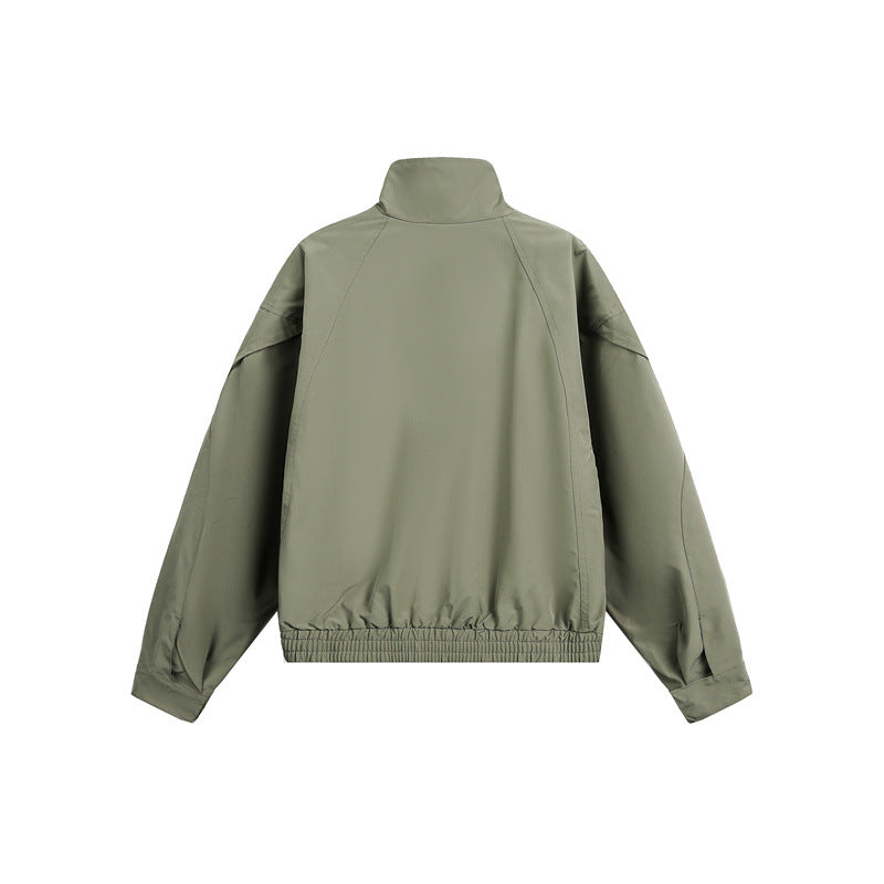 Unisex Kurzblouson im minimalistischen Tech‑Stoff mit Funnelkragen und verdeckter Frontblende Shop Nory