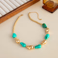 Damen elegante und modische Kette mit goldenen und türkisfarbenen Elementen Shop Nory