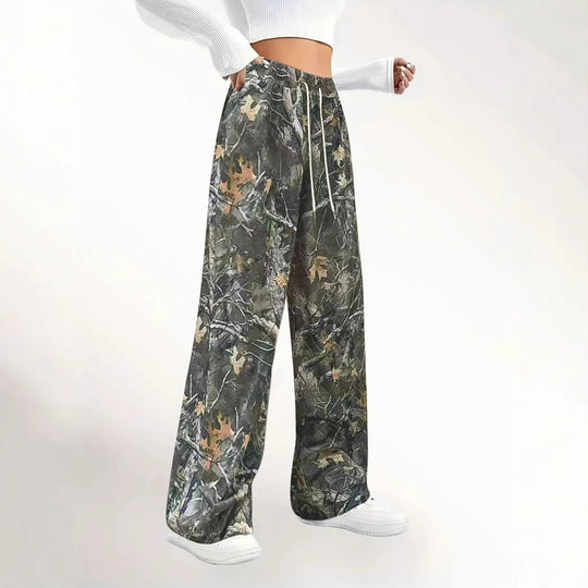 Damen Weite Palazzo-Loungehose im Camouflage-Blattmuster mit Elastikbund, Tunnelzug und Eingrifftaschen Shop Nory