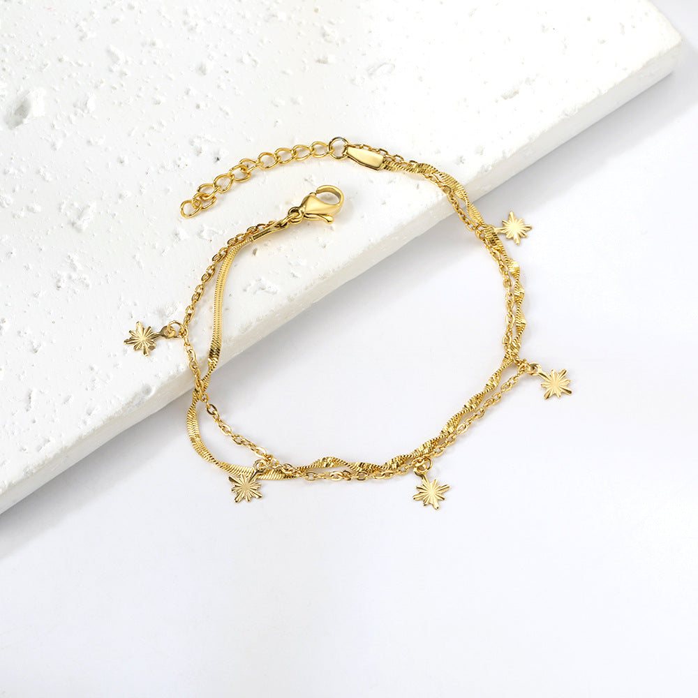 Damen zartes Armband mit erstellt Charm-Anhängern aus Edelstahl und goldplattierter Oberfläche Shop Nory