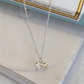 Damen Halskette mit filigranem Schleifenanhänger und hochwertiger Gliederkette Shop Nory