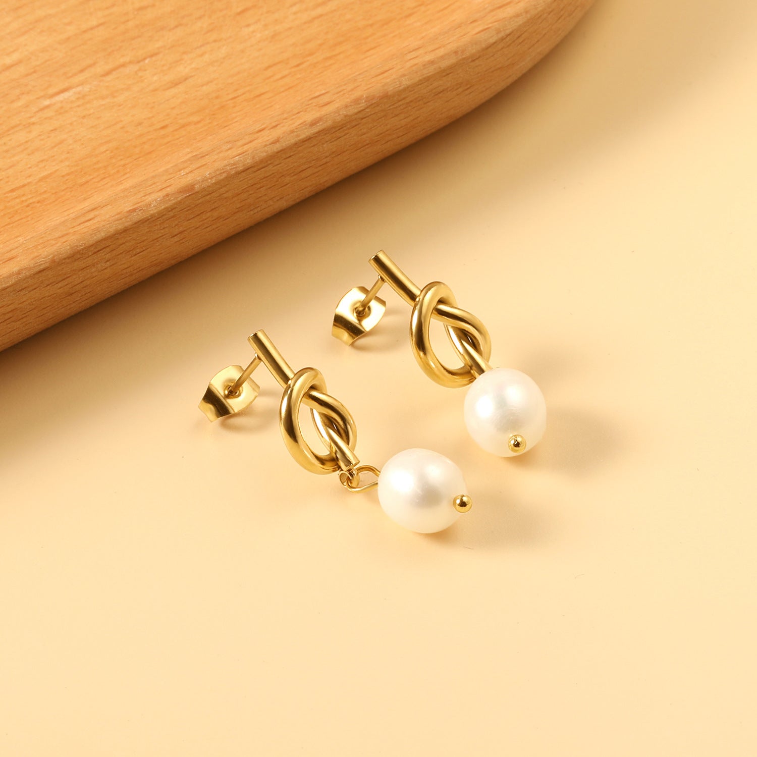 Damen Ohrhänger mit elegantem Knotendesign und Perlen aus hochwertigem Edelstahl Shop Nory